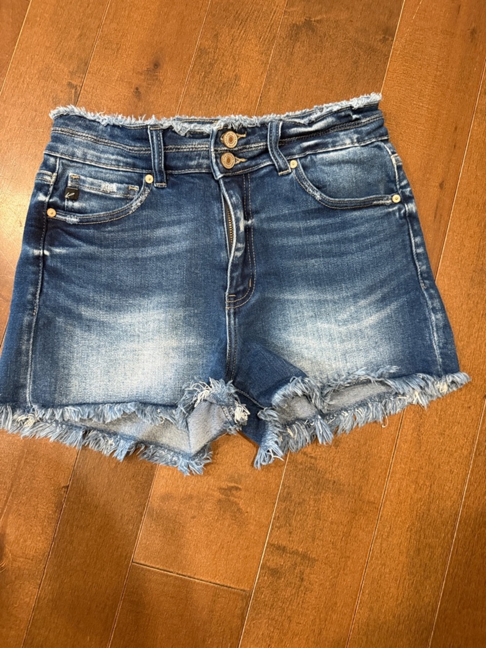 KanCan Distressed Frayed Hem Denim Shorts in Blue Wash